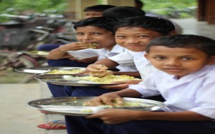 Akshaya Patra mid day Meal beneficiaries having lunch in a school of Assam